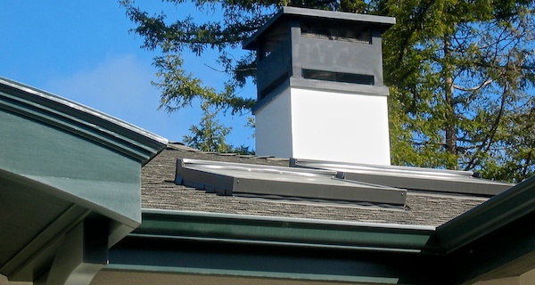 roofing with sky lights and chimney